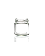 Discover the 106ml Glass Panelled Jar with Twist-Off Lids, perfect for homemade jams, chutneys, pickles, and preserves. Available in wholesale pallets for bulk orders and commercial use.