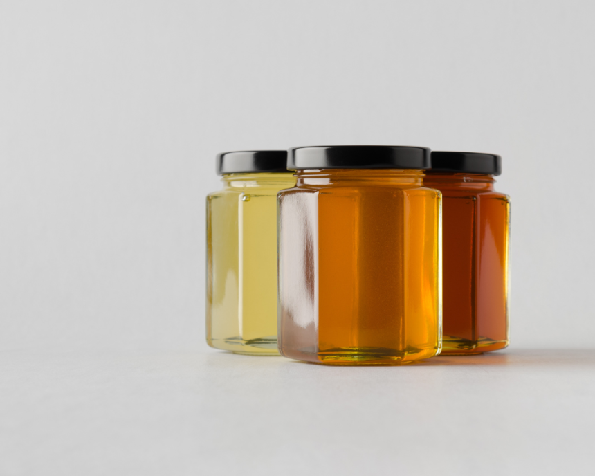 honey in hexagonal jars